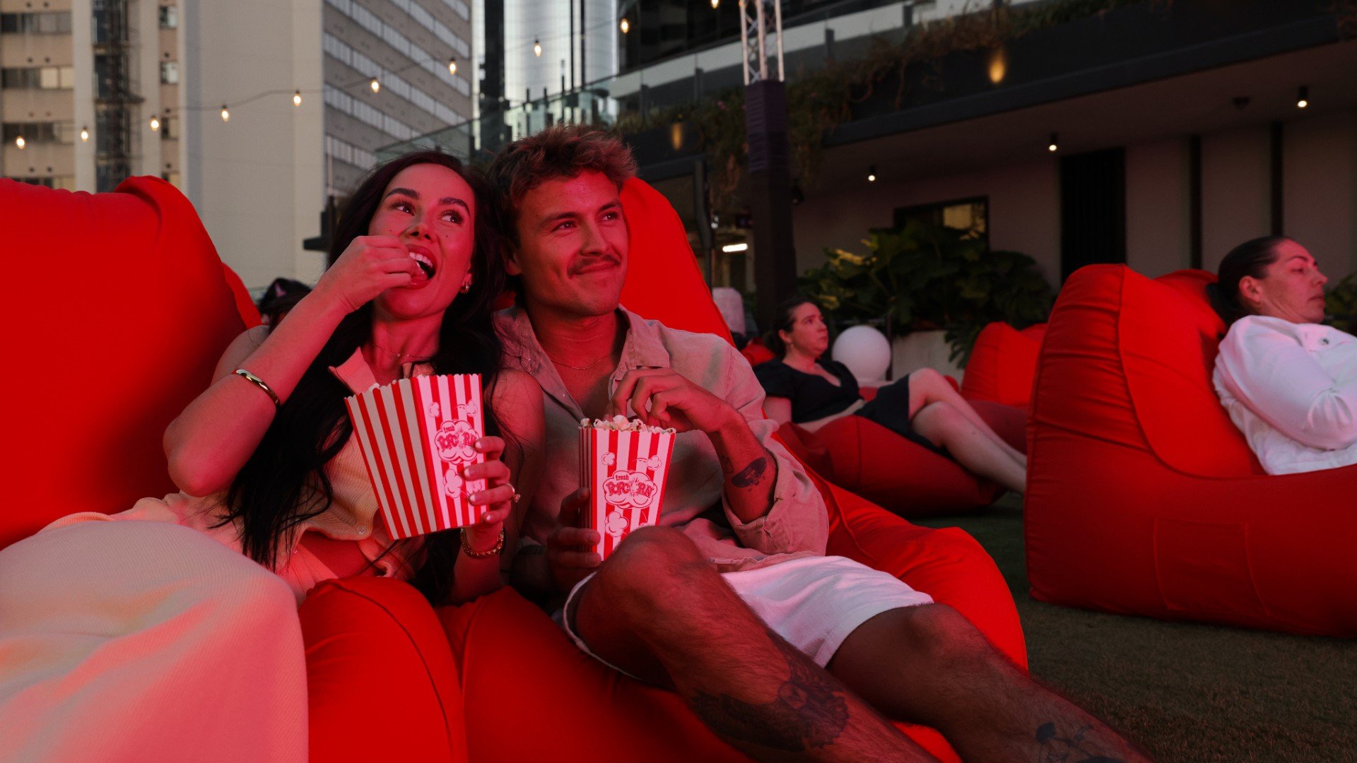 the star brisbane skyline cinema couple eating popcorn
